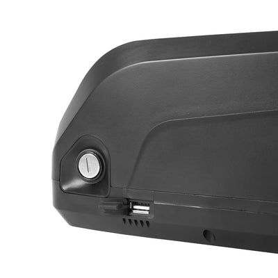 Close-up of an e-bike battery’s USB port, with a protective cover